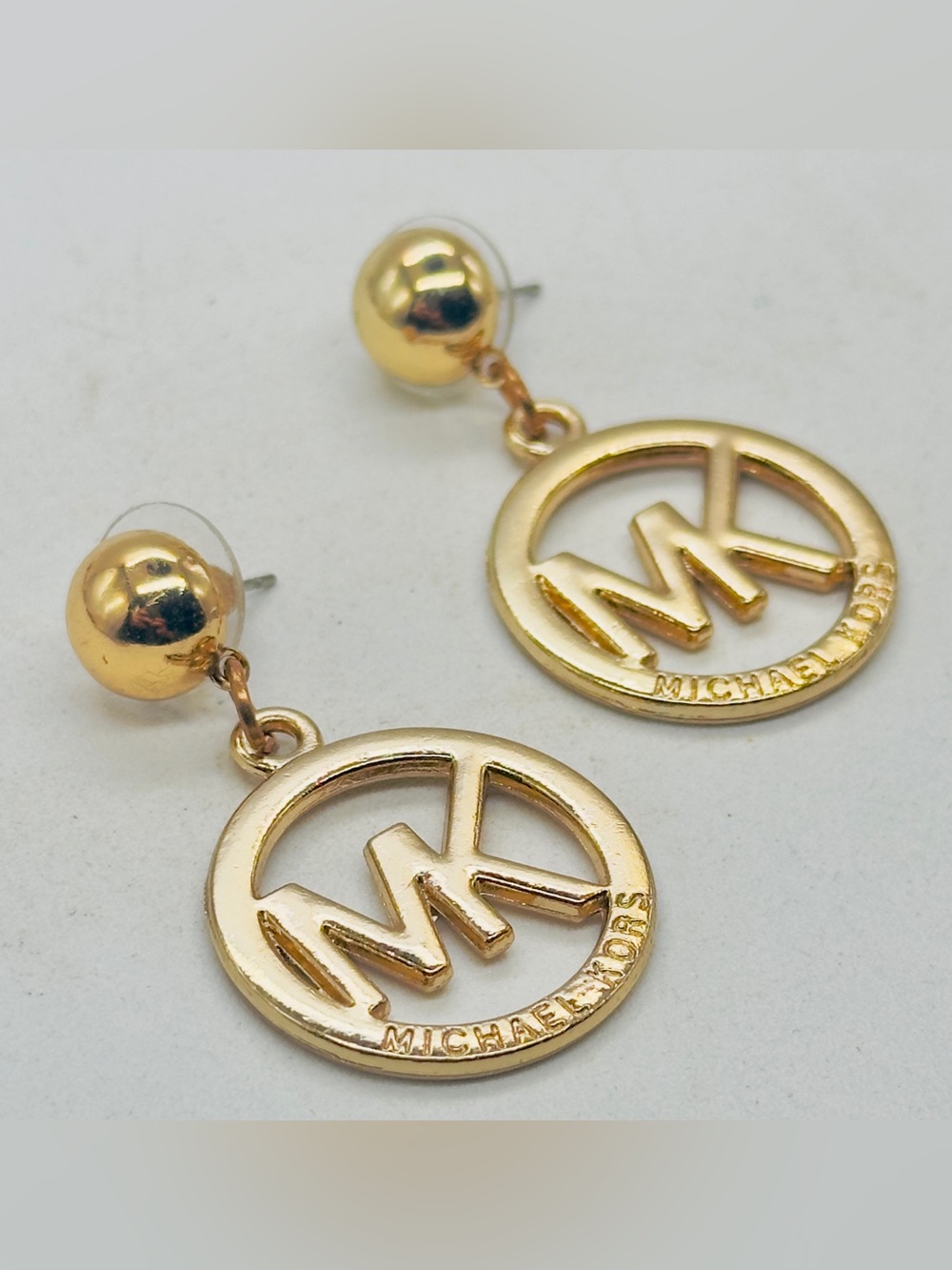 Michael Kors Gold Tone Logo Drop Stud Earrings Pierced